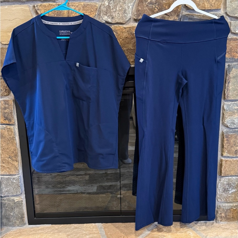 Navy Fabletics scrubs with kick flare leggings